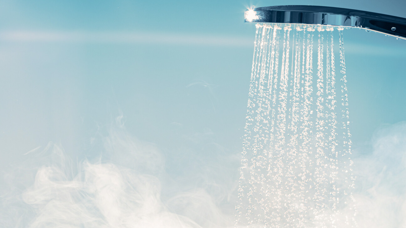 Shower With Flowing Water And Steam